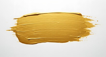 A golden paint stroke on a white background showing texture and brush marks in a smooth and even layer
