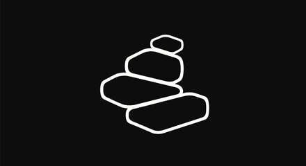 Stacked balanced stones symbolizing peace and harmony.