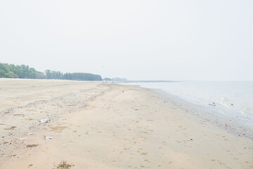 Peaceful tide rolling slowly over sandy edge creating calming seaside scene at Bashkhali.