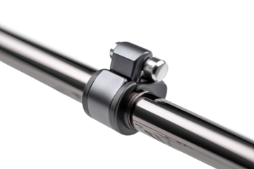 Close-up of a gray metal clamp secured around a polished chrome or stainless steel bar.  Two small, dark gray components are visible within the clamp