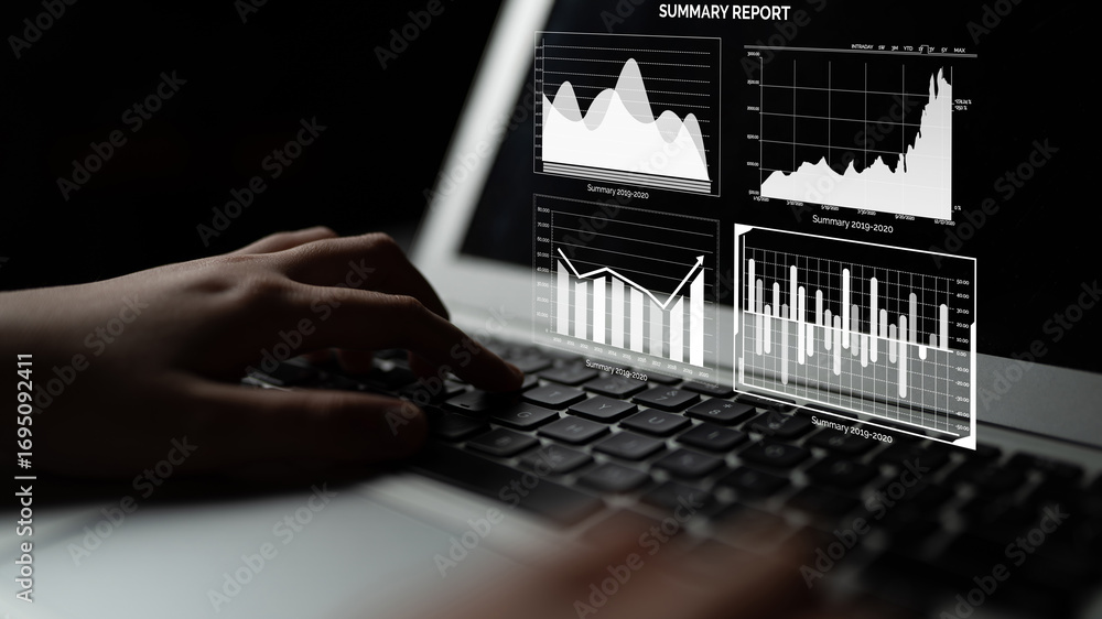 Poster A close-up view of hands typing on a laptop keyboard with visual data analytics charts displayed on the screen, showcasing financial details and market trends. Impute