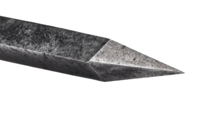 Close-up of a weathered, pointed tool