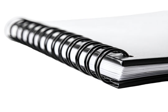 Close-up of a spiral-bound notebook.  Blank white pages are visible, bound by a black metal spiral