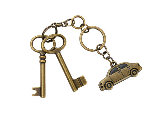 Isolated decorative keychain with two antique keys and a car trinket, metal trinket accessory
