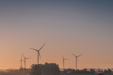 Obraz premium Wind turbines as green energy for the Pałuki region