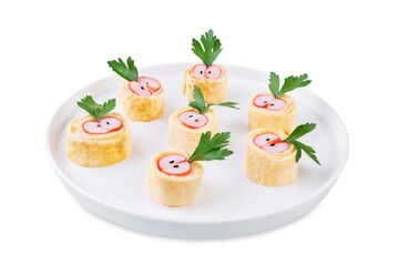 Omelette egg roll with imitation crab meat filling, tamagoyaki, in a plate on a white isolated background