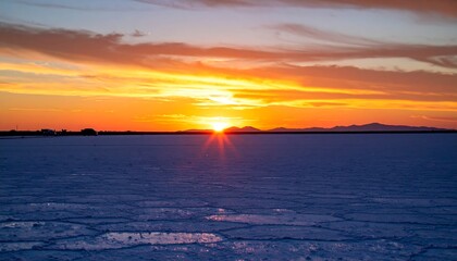 Fototapeta premium Stunning sunset over a salt flat