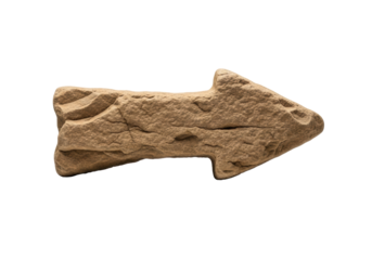 Ancient rough-hewn sandstone arrow, rugged and ochre with chisel marks, blocky, pointing right on a transparent seamless background, macro studio shot with subtle shadows, concept of ancient enduring