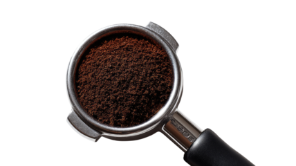 Espresso grounds portafilter closeup; dark background, coffee preparation