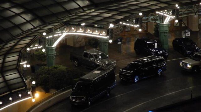 Luxury Valet Service at a Las Vegas Resort With Black Sedans