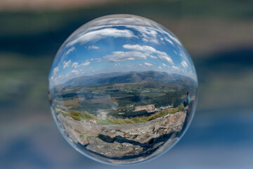 Crystal Ball reflection of Nevis Range in Scotland