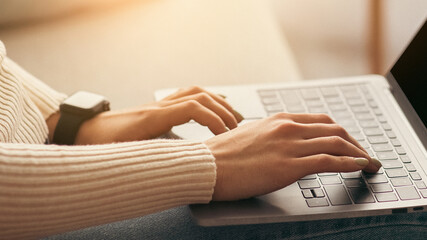 Modern work from home, surfing on internet, new normal and self-isolation during covid-19. Young...