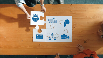 A vibrant scene depicting a collaborative team engaging in a puzzle activity that symbolizes...