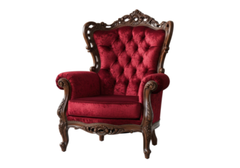 Ornate vintage armchair with high tufted back, rich deep red crushed velvet, dark mahogany frame, intricately carved, isolated on transparent background with copy space. Concept of classic elegance