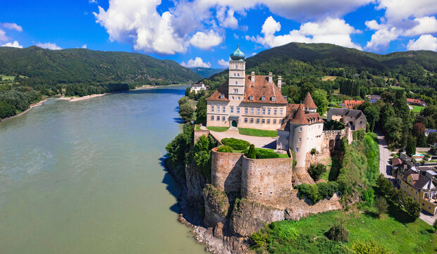 Lower Austria tourism and landmarks. Schonbuhel Aggsbach, Schonbuhe Castle in the Wachau Valley, Danube River cruise. aerial drone panoramic view