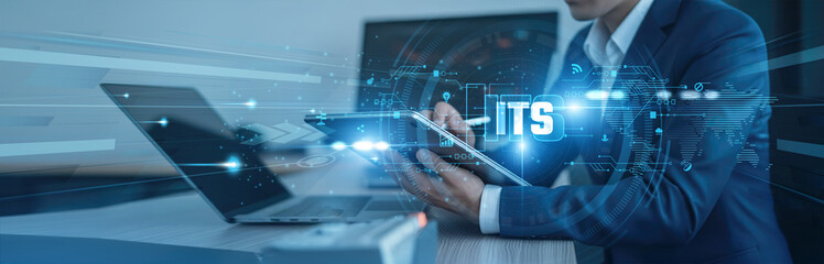 Intelligent transportation, smart mobility Businessman using tab with analysis data of growth to...