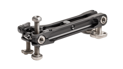 Black, metallic mechanical linkage.  Bolts, joints, and plates.  Precise engineering