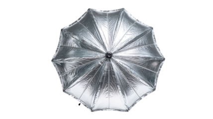 Overhead view of a silver studio umbrella.  Reflective surface.  Studio lighting accessory
