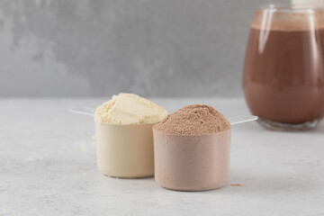 Nutritious protein powder with chocolate and vanilla flavor. Sports nutrition.