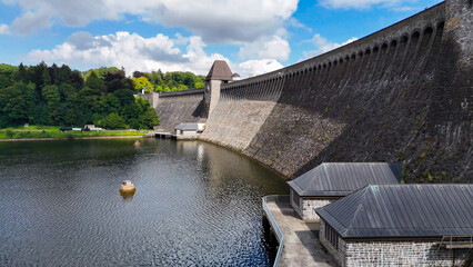 Aerial drone view of a huge stone dam on the lake Monetalsperre - Spermauer, Germany