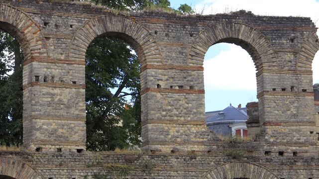 Arcades of the ruins of Palais Gallien in the center of Bordeaux, France