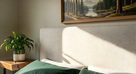 Fototapeta premium Serene Bedroom Interior With Nature-Themed Art and Morning Light