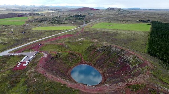 Drone Overview of Kerid Crater Parking Lot and Tourists