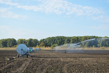 self-propelled irrigation system for industrial irrigation of agricultural fields. irrigation and fertilization of fields with growing crops. irrigation and melioration