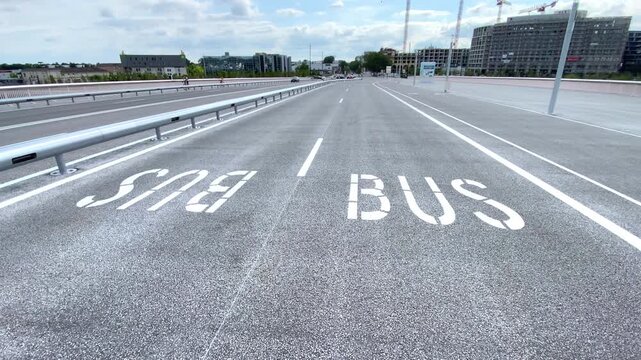 Bus lane markings on the Pont Simone Veil bridge in Bordeaux, France