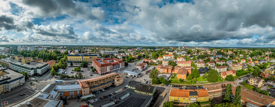 V&auml;xj&ouml;'s twin spires rise above a mosaic of green spaces, a sustainable city where nature and urban life seamlessly intertwine
