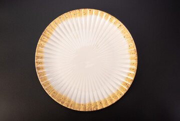 Beautiful plate, beautiful plate alone placed on a dark background, selective focus.