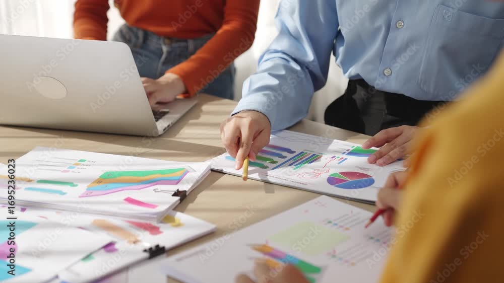 Aufkleber startup company employee work together, analyze colorful bi dashboard paper with financial data repo