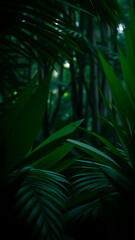 Green forest of dark green tropical leaves vertical