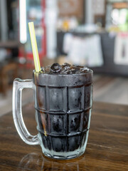 Close up of Thai style ice black coffee ,selective focus