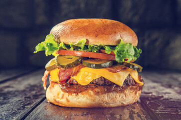 A juicy smash burger captured in a professional shot, featuring a perfectly seared patty, melted cheese, fresh toppings, and a golden toasted bun, styled to highlight flavor and texture