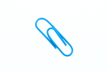 blue paper clip on white background
