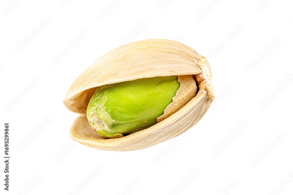 Poster isolated pistachio nut with open shell and green kernel on white background