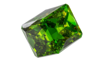 A green gemstone with a triangular shape