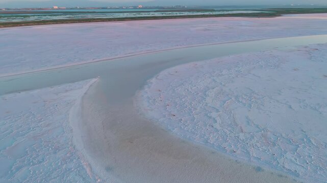 Aerial view of the San Francisco Bay Salt Ponds, Fremont, California, USA. The ponds are used to evaporate seawater to produce salt. The colors are due to different salinity levels.