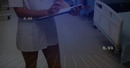 Writing female nurse wearing tunic recording notes at hospital bedside, with clipboard pen trolley