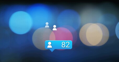 Floating three white user icons around bright blue notification bubble on screen, bokeh background