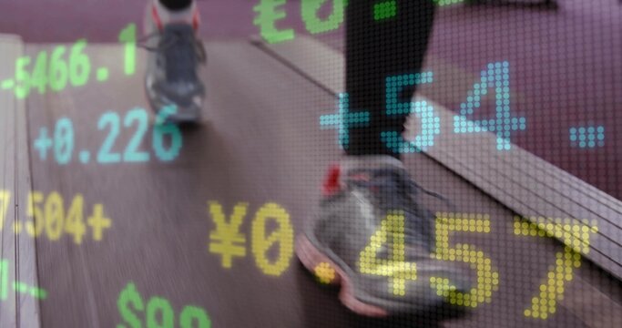 Gliding feet wearing gray pink shoes on treadmill belt in home gym, with digital stock overlay