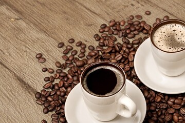 Coffee cup and beans on  desk background