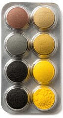 Colorful powders in small containers.