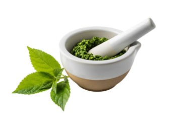 Freshly made pesto with basil leaves and mortar and pestle Isolated on transparent background

