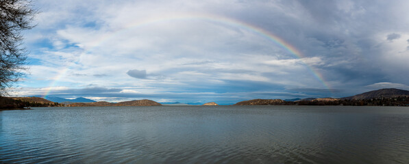 Rainbow over Upper Klamath Lake after a rainfall, Klamath Falls, Oregon, USA.