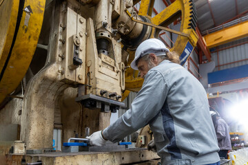 Industrial Engineer in Hard Hats.Work at the Heavy Industry Metal Sheet Manufacturing Factory....