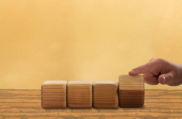 Transitioning to 2025 on wooden cubes, new year concept