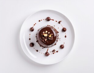 Flat Lay of Chocolate Dessert with Nuts on White Plate