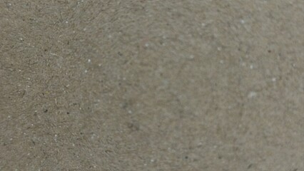 Rough Recycled Cardboard Texture. Gritty Brown Paper Surface with Visible Fibers and Speckles. Eco-Friendly Background.